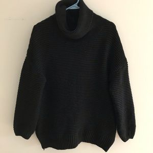 Black chunky knit turtleneck sweater.
